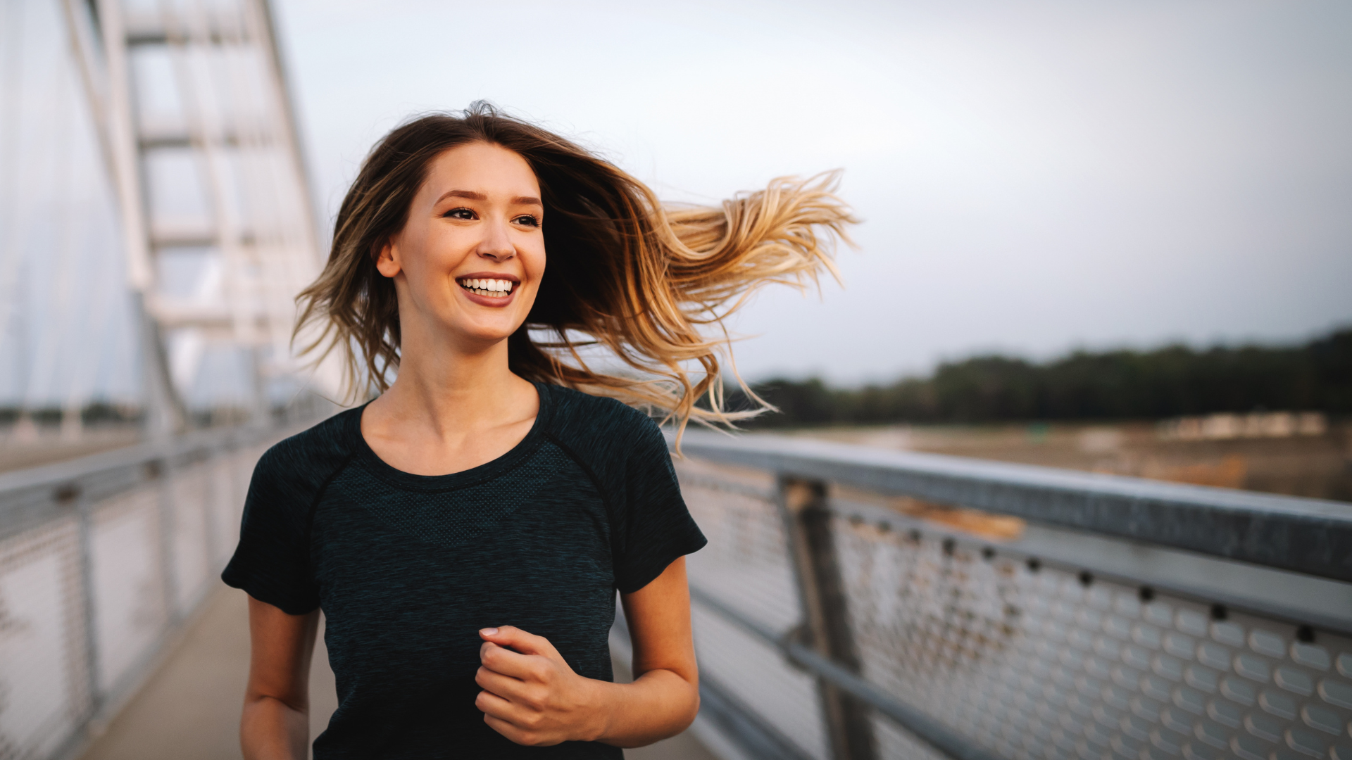 A confident, radiant Ascent Trim & Wellness client