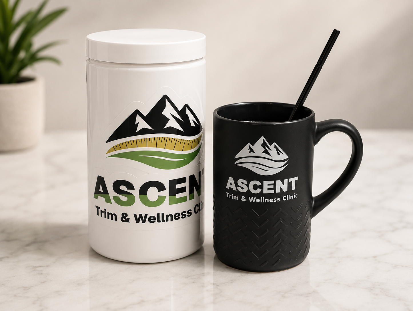 Ascent Trim & Wellness Clinic branded supplement container and mug