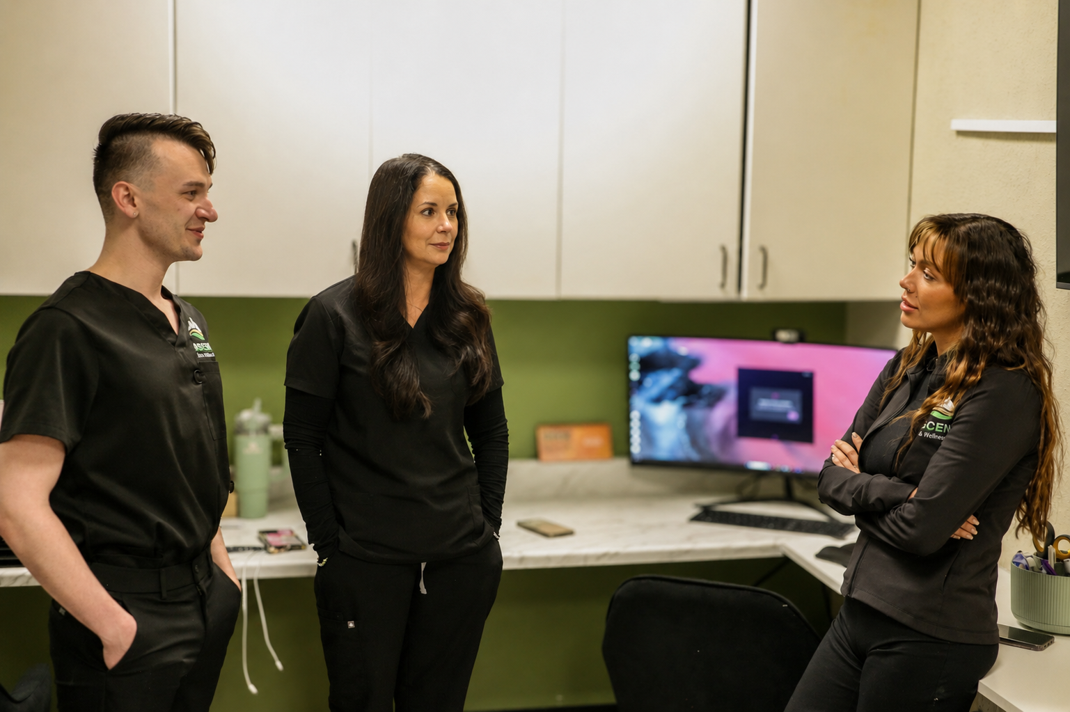Ascent Trim & Wellness team consulting in the clinic